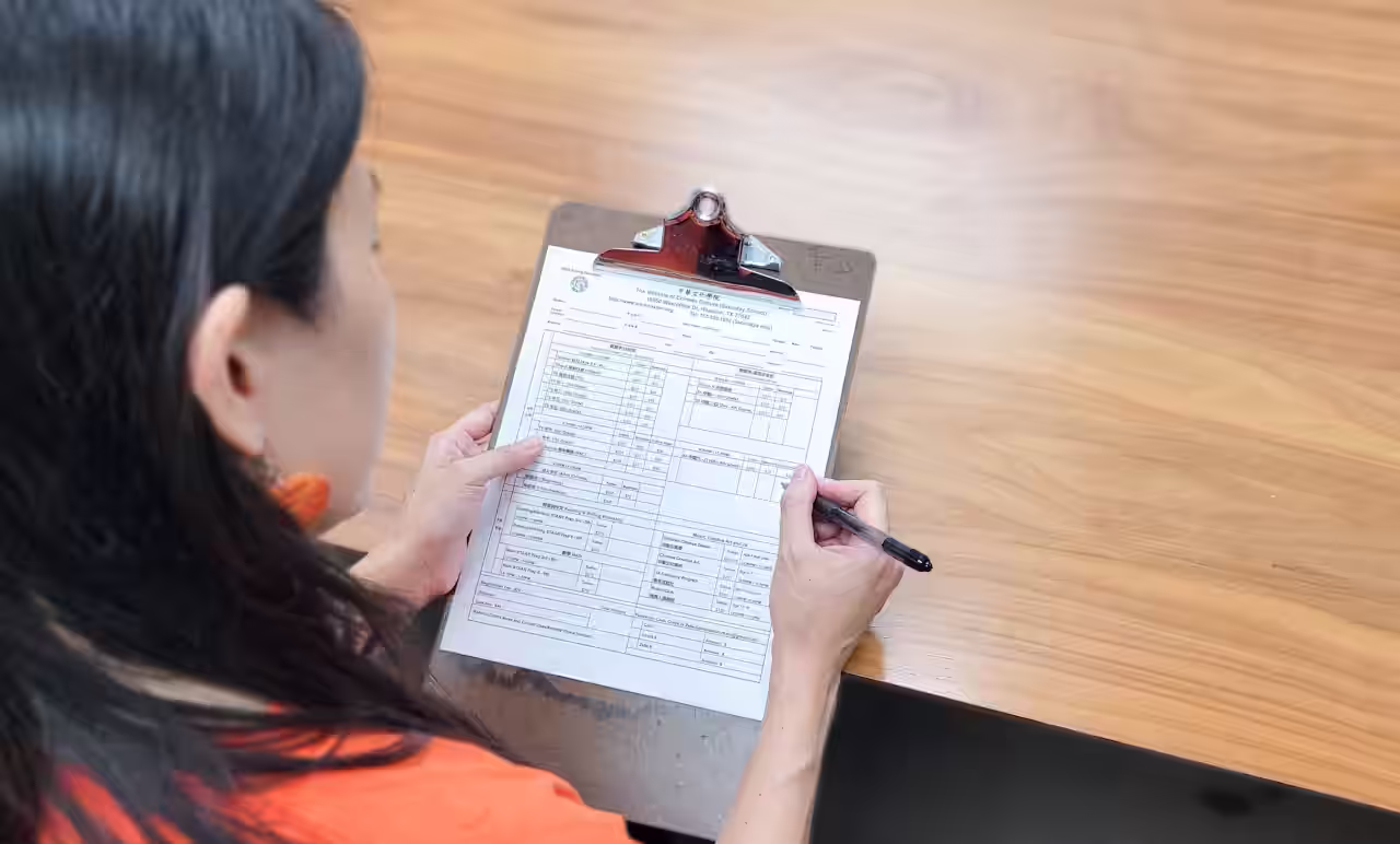 Student filling out registration form